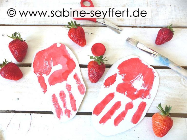 DIY Bastelidee für Kinder Lustige Erdbeeren aus Handabdruck mit