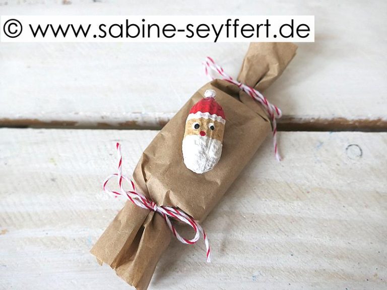 Geld Geschenke zu Weihnachten schön verpacken Weihnachtsmann aus